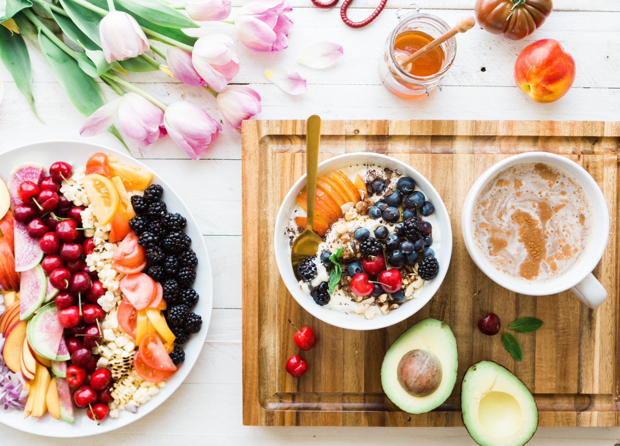 Image of a layout of fresh fruits, coffee, and flowers. Detoxification, nutrition, and movement are some of the ways our functional medicine doctor treats the cause of chronic disease. Start restoring your health and feeling better with functional medicine in Orland Park, IL 60487. Call today.