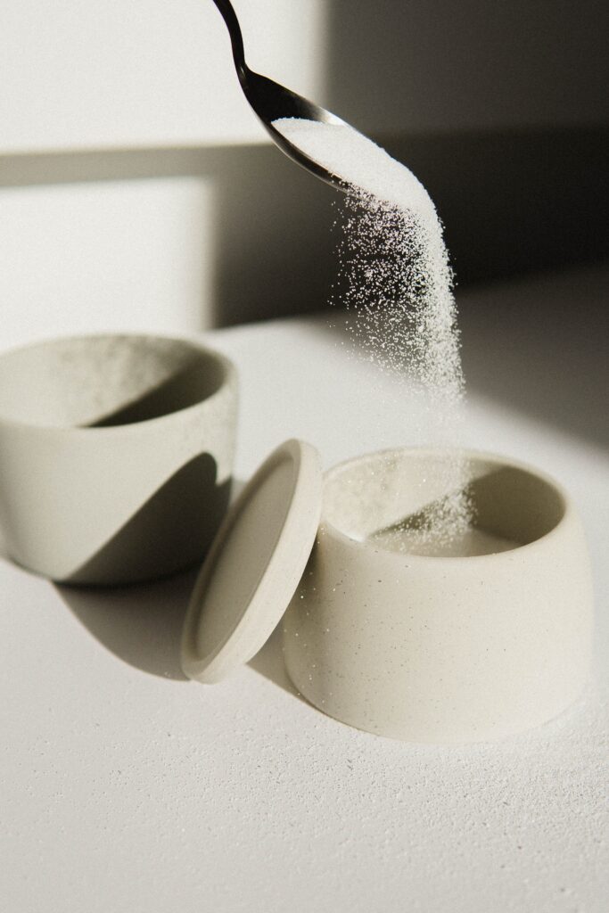 Image of a spoon pouring sugar into a container. Have you been looking for a "holistic doctor near me"? I can help give you an immune system boost. Contact us to learn about SHAPE ReClaimed and functional medicine in Orland Park, IL 60468. Call today!