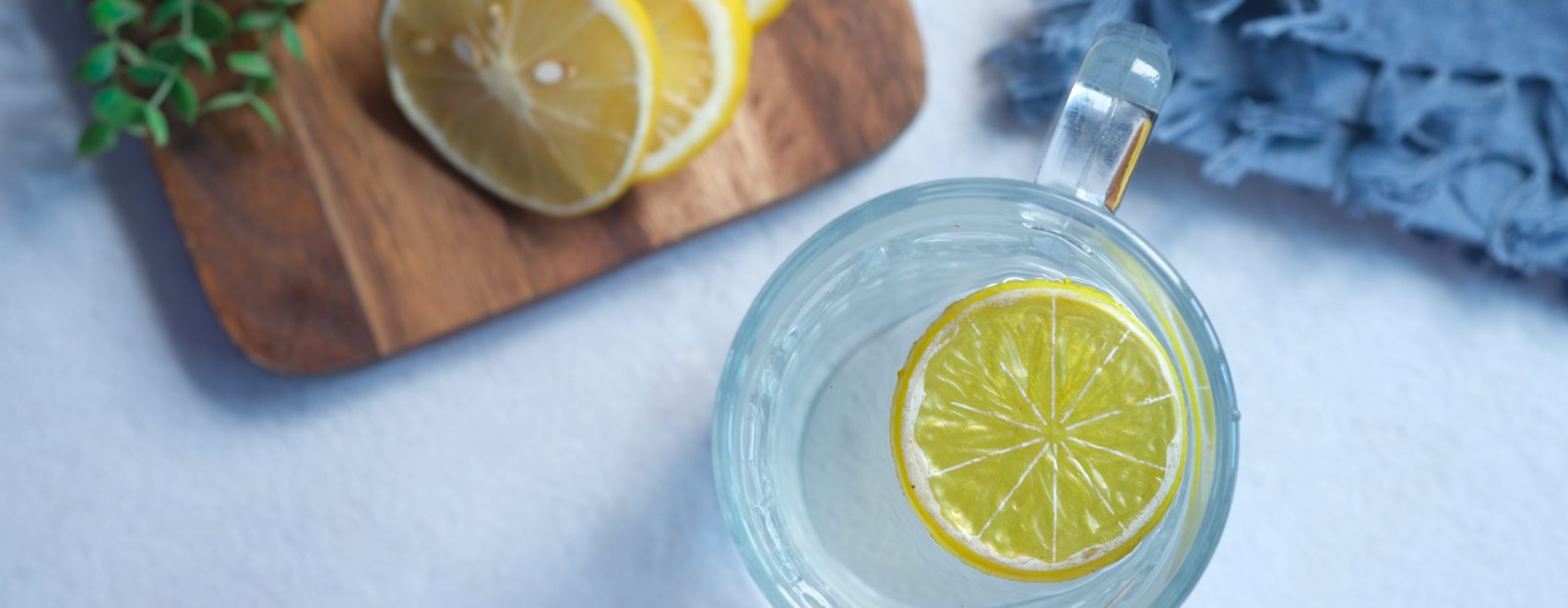 Image of a lemon in a glass of water. Now is the time to give yourself an immune system boost. A holistic doctor in Orland Park, IL can help you get started in SHAPE ReClaimed. That and functional medicine can help you support your immune system. Call today!