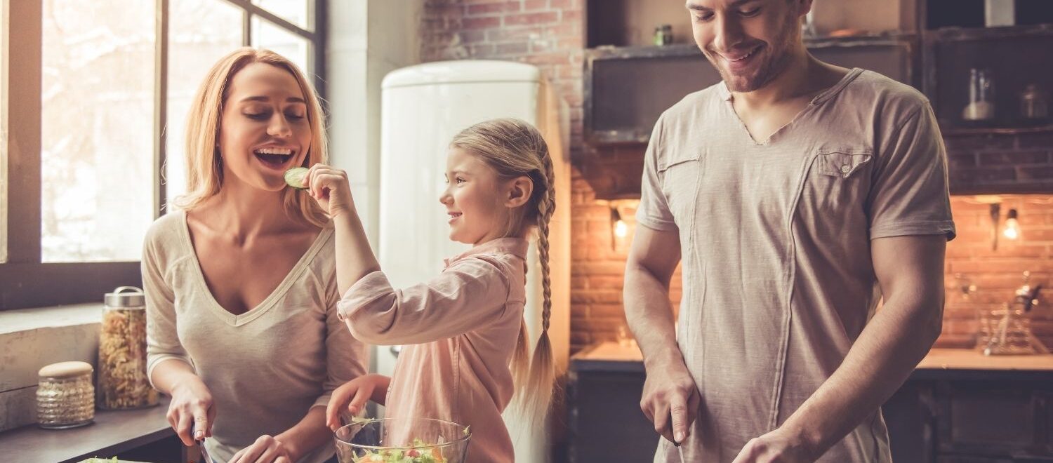 Image of a family of 3 cooking and eating together. Our holistic doctor can help you with hormone imbalance. The shape reclaimed program can help! Reach out to get an immune system boost with help from a functional medicine doctor in Orland Park.