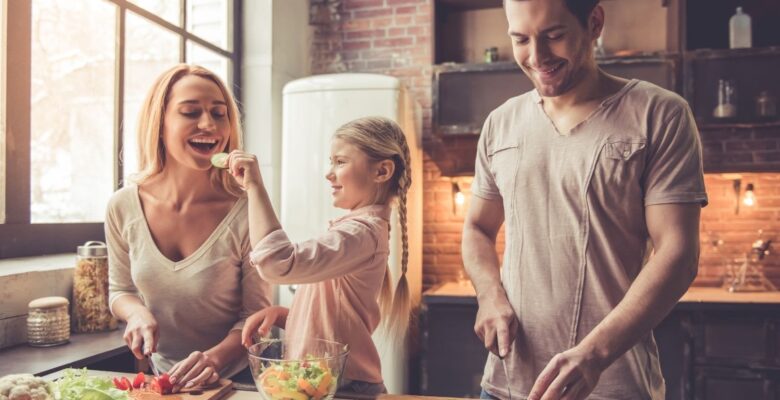 Image of a family of 3 cooking and eating together. Our holistic doctor can help you with hormone imbalance. The shape reclaimed program can help! Reach out to get an immune system boost with help from a functional medicine doctor in Orland Park.