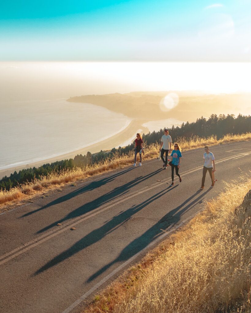 Image of four people walking along a road. What is functional medicine? Functional medicine looks at the patient as a whole. Call today to talk to a functional medicine doctor in the Chicago area.  