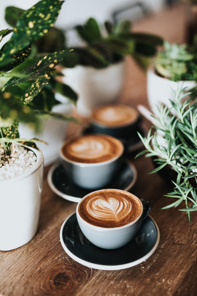 A close up of coffee cups represeting how caffeine can effect you. Learn how genetic screening in Orland Park, IL can offer support by searching for a holistic doctor in Orland Park, IL today. They can offer genetic testing in Orland Park, IL and other services. 