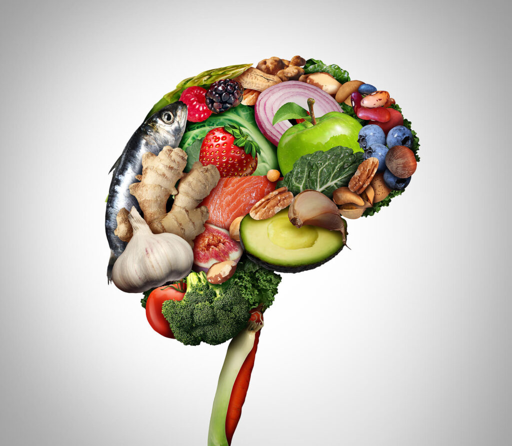 Image of food placed in the shape of a brain to show how much thought goes into a functional medicine approach to chronic digestive disease. It doesn't have to be as difficult with the support of a functional holistic doctor in Orland Park, IL.