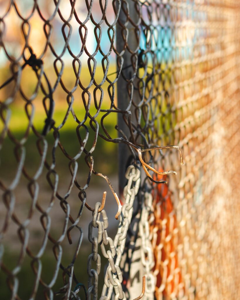 Image of a rusted and broken chain link fence. Have you been wondering what is chronic disease and how it affects you? Our functional medicine doctor in Orland  Park, IL can help you understand it & its effects. Functional medicine is about making healthy life changes to help your restore health in Orland Park and the Chicago area.