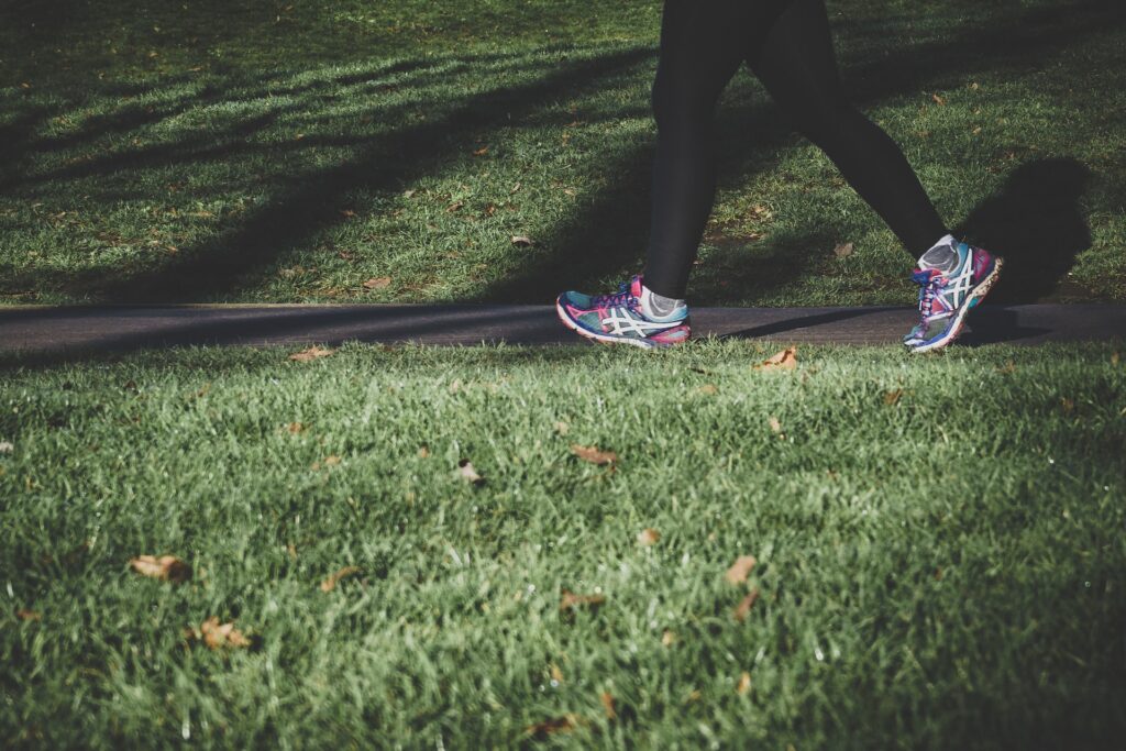 A close up of feet walking along a footpath. Learn more about functional medicine in Orland Park, IL by searching “what is functional medicine Chicago area” today or contacting a functional medicine doctor in Orland Park, IL today. 
