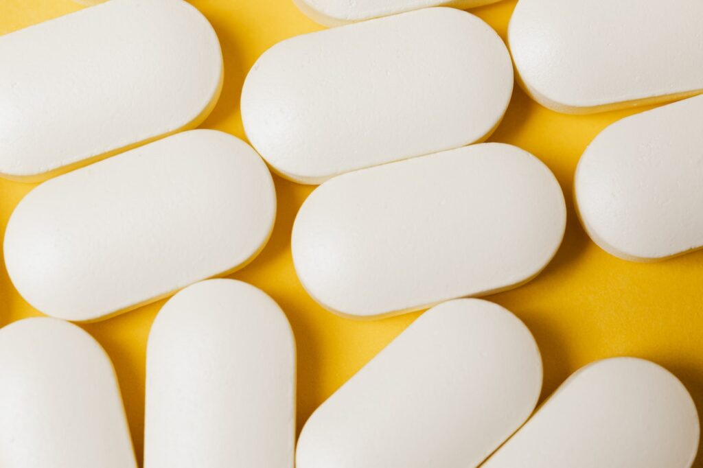 A close-up of medicine tablets representing medications that can cause estrogen to rise. Learn how a functional medicine doctor in Orland Park, IL can offer support by searching for what is functional medicine Chicago area today. Functional medicine in Orland Park, IL can offer support today.
