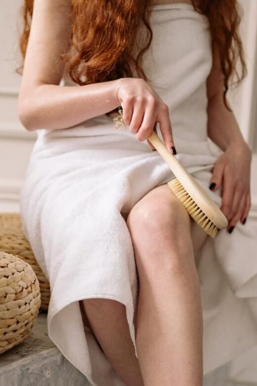 A close up of a person brushing their leg. Learn how a functional medicine doctor in the Chicago area can help you understand the benefits of dry brushing. Search for massage therapy in Orland Park, IL and other services by contacting a massage therapist in Orland Park, IL today.