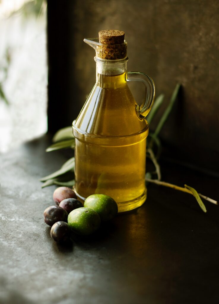 A close up of a jar of oil representing a food for adrenal health. Learn more about what is functional medicine Chicago area by contacting a functional medicine doctor in the Chicago area.
