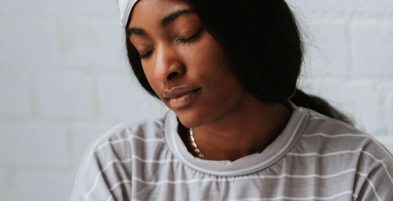 Shows a woman looking sluggish with an eye mask. Represents how functional medicine in orland park, il which can be paired with chiropractic care in orland park, il can help you rest and have more energy.