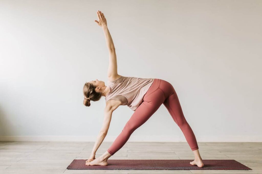Woman doing yoga. Support your nervous system and restore balance with functional medicine in Orland Park, IL.