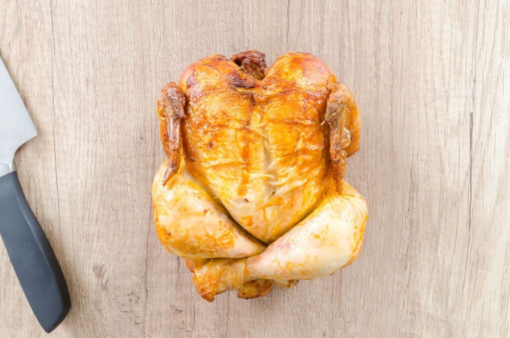 chicken | functional medicine in Orland Park, IL | functional medicine doctor | what is functional medicine | Orland Park | Tinley Park | Frankfort Whole chicken sitting on a wooden table with a butchers knife. Wondering if you have diabetes? Learn how functional medicine in Orland Park, IL can help you overcome sleepiness after eating.